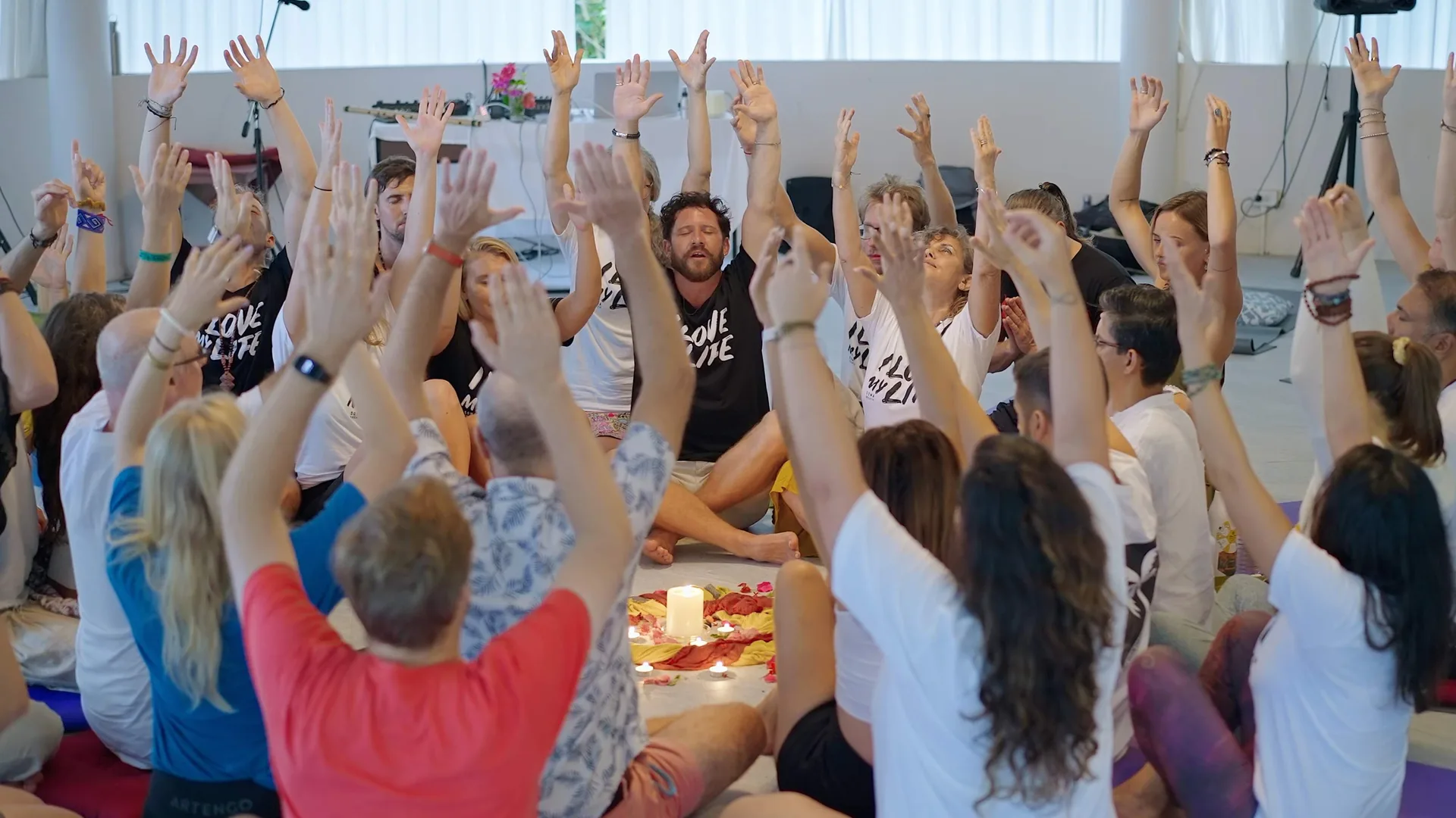 Steve leading a hands-raised group session